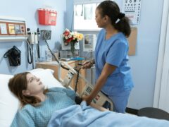 Female nurse measuring the pressure of a hospitalized patient